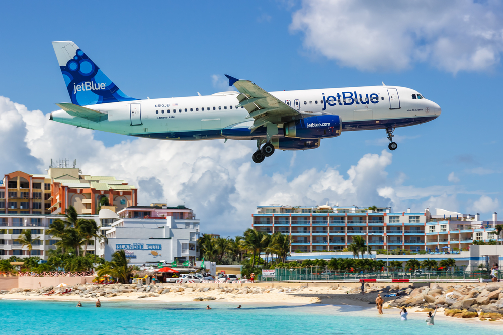 a JetBlue plane lands in Caribbean